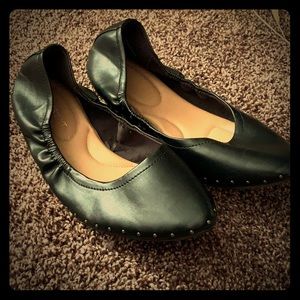 Black studded flats